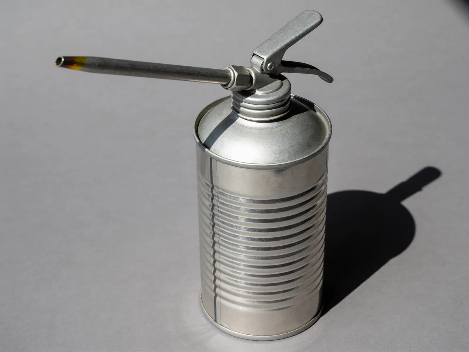 Oil Can, Filled — Tin-plated steel, thumb pump, 200 ml